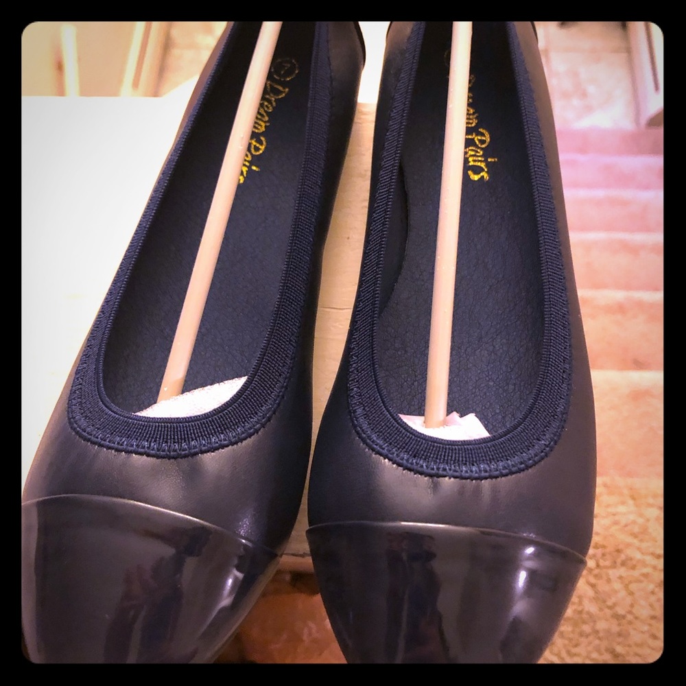 New in Box! Size 7 Navy blue ballet flats.